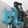 Perfo burineur Makita DHR243RTJ mis en avant mur 2